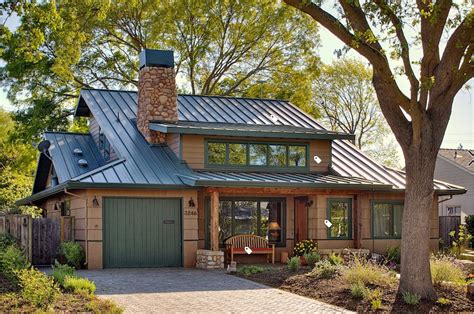 beige siding house with green metal roof|house with green roof colors.